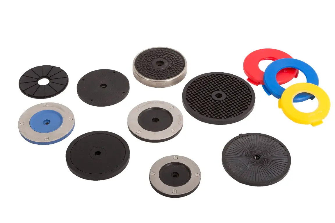 Base plates for bottling and packaging equipment