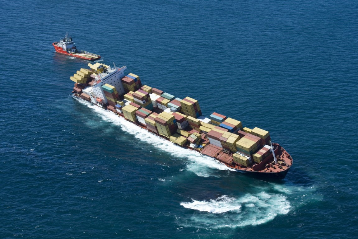 large ship carrying containers in the ocean